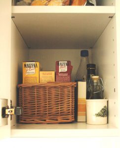 Organise your kitchen - use bins to group similar items